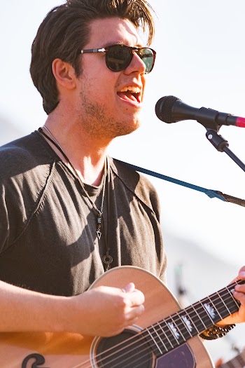 Man Holding Guitar