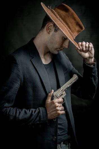 Man Holding Gun 