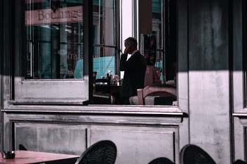 man holding his ear