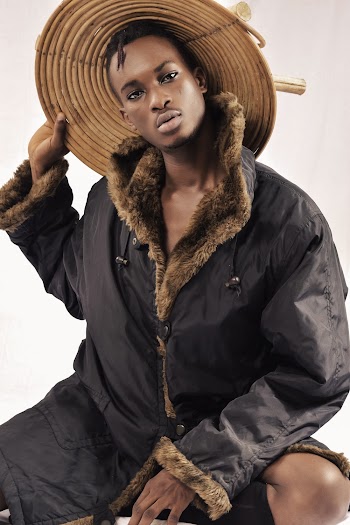 Man Holding His Hat