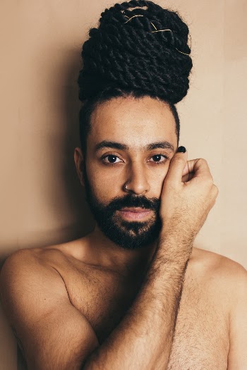 Man Holding His Left Face