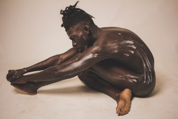 Man Holding His Toe