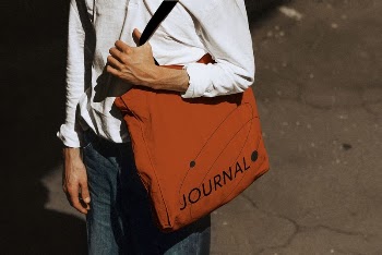 Man holding journal tote bag | Free Photo - rawpixel