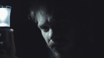 Man Holding Led Lantern
