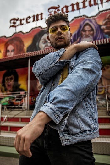 Man Holding Left Arm