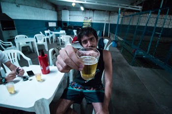 Man Holding Liquor Filled Drinking Cup