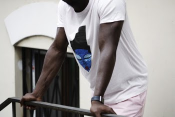 Man Holding Metal Handrail