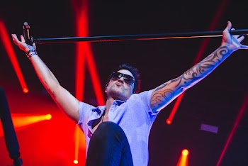 Man Holding Microphone Stand