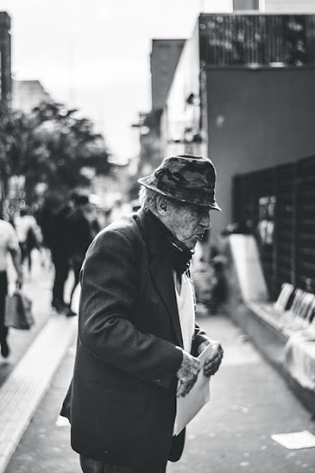 Man Holding Paper