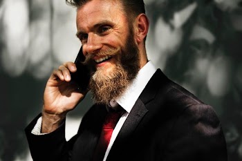man holding phone and use it
