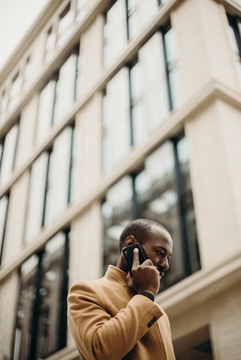 Man Holding Phone on His Ear