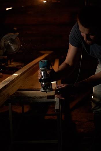 Man Holding Power Tool