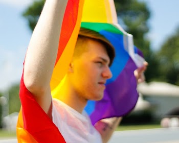 Man Holding Pride Flag
