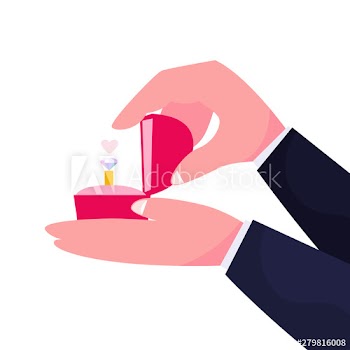 Man holding ring with a diamond in the red box