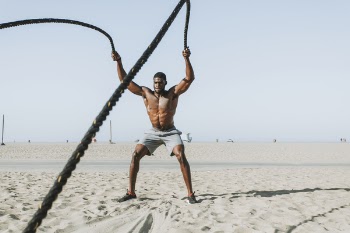 Man Holding Rope on Both Hands
