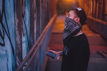 man holding spray bottle