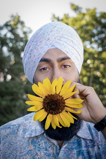 Man Holding Sunflower
