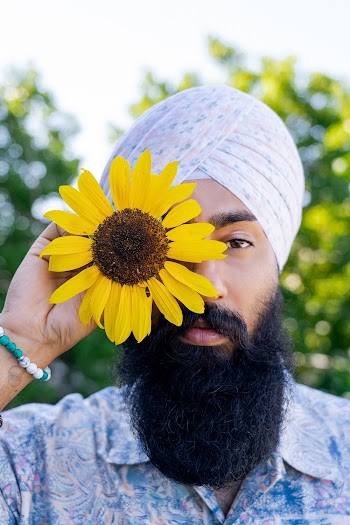 Man Holding Sunflower