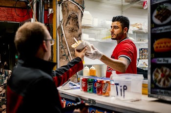 Man Holding Taco