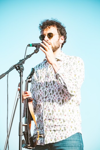 Man Holding the Microphone