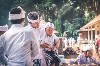 Man Holding Toddler