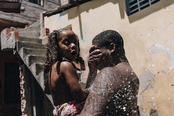 Man Holding Toddler