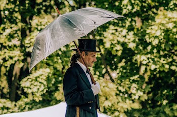 Man Holding Umbrella
