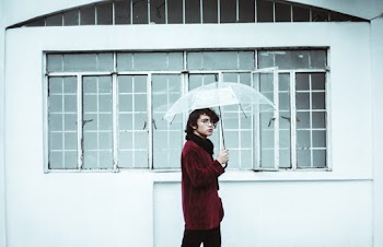 Man Holding Umbrella