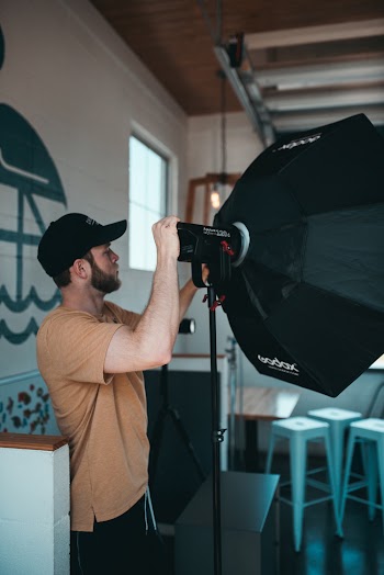 Man Holding Umbrella Reflector
