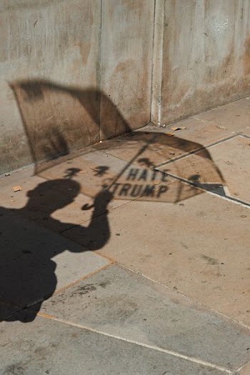 man holding umbrella silhouette