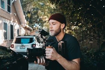 Man Holding  Video Camera