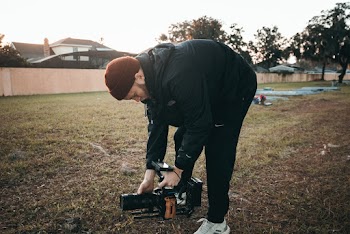 Man Holding Video Camera