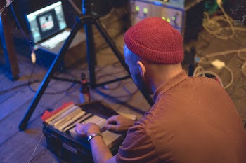 Man Holding White Disc Cases