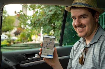 Man Holding White Samsung Galaxy Note 4