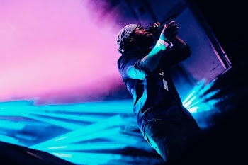man holding wireless microphone