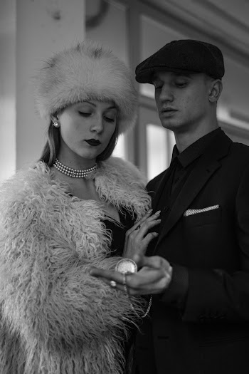Man Holding Woman's Hand