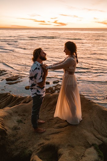 Man Holding Woman's Hands
