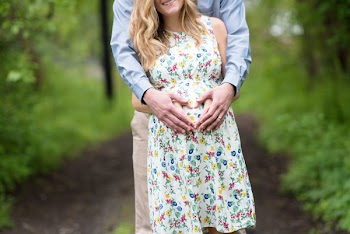 Man Hugging Pregnant Woman