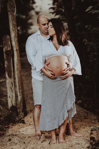 Man Hugging Pregnant Woman