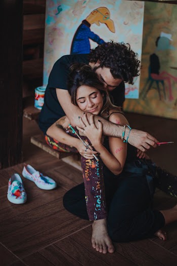 Man Hugging Woman