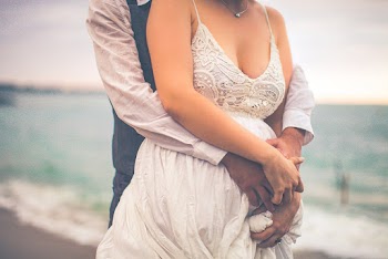 Man Hugging Woman