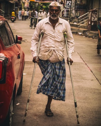 Man In A Crutch