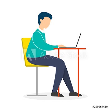 Man in a suit sitting at the desk and working