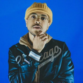 Man in a Yellow Knitted Beanie and Black Hoodie