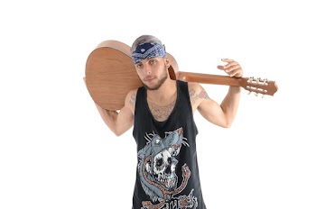 Man in Black and Grey Tank Top Carrying Brown Classical Guitar