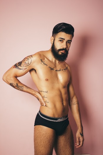Man in Black Brief Posing