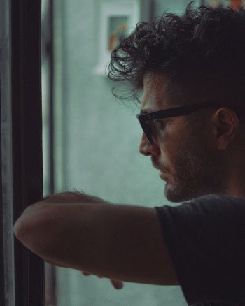 Man in Black Crew Neck T-shirt Wearing Black Framed Eyeglasses · Free Stock Photo
