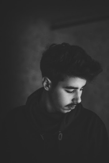 Man in Black Jacket Photo