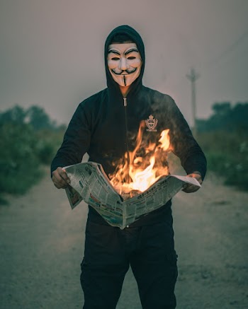 Man in Black Jacket Wearing A Face Mask 