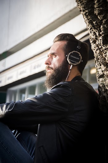 Man in Black Jacket With Headphones